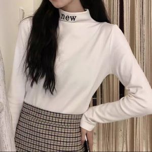 Reversible high neck top
